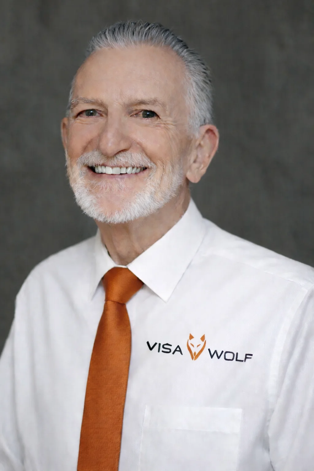 Headsot with Burnt orange tie Headsot with Burnt orange tie